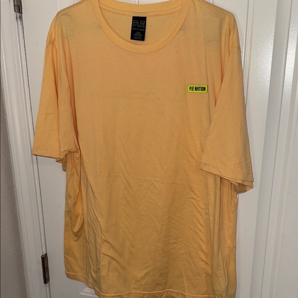 P.E Nation Women's Short Sleeve In Play Tee in Soft Golden Sand